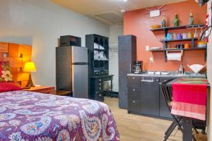 a kitchen and a bedroom with a bed and a sink at 2 Mi to Shopping and Dining Santa Rosa Studio in Santa Rosa