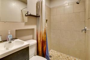 a bathroom with a toilet and a sink and a shower at 2 Mi to Shopping and Dining Santa Rosa Studio in Santa Rosa +17 photos