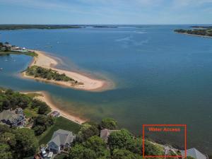 an aerial view of a beach in the water at Great location with Water Views in Harwich