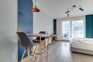 Posteľ alebo postele v izbe v ubytovaní Apartments Old Town Angielska Grobla & by Noclegi Renters