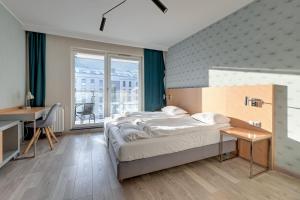 Posteľ alebo postele v izbe v ubytovaní Apartments Old Town Angielska Grobla & by Noclegi Renters