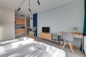 Posteľ alebo postele v izbe v ubytovaní Apartments Old Town Angielska Grobla & by Noclegi Renters + 37 fotografií