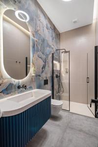 Koupelna v ubytování Monamel Luxury Suites