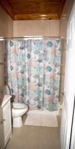 Ένα μπάνιο στο Tangerine Sunsets Satsuma One