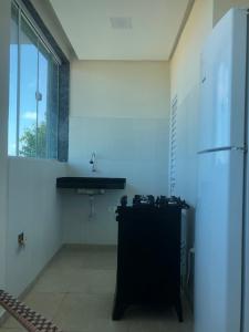 Kuchyň nebo kuchyňský kout v ubytování FLATS REGAMAR - Porto de Galinhas