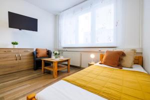 Postel nebo postele na pokoji v ubytování Hotel U Nádraží