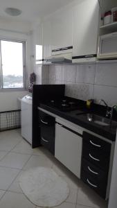 Η κουζίνα ή μικρή κουζίνα στο Apartamento em Guarapari