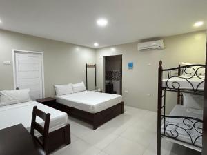 Voodi või voodid majutusasutuse Samba Bluewater Resort toas