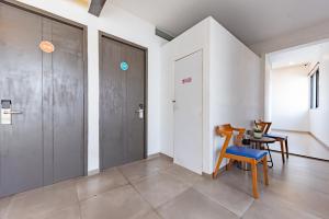Fotografie z fotogalerie ubytování Sans Hotel Bobosini Malang by RedDoorz v destinaci Malang