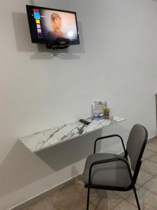 TV a/nebo společenská místnost v ubytování departamentos economicos en cu