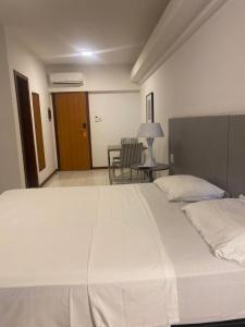 Postel nebo postele na pokoji v ubytování Loft 3 Edf Celita Franca Business e flat