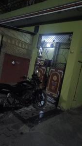 a motorcycle parked in front of a building at Mishra villa in Prayagraj
