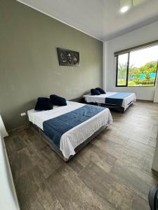 Katil atau katil-katil dalam bilik di Quinta La Bonita Restrepo-Meta