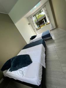 Katil atau katil-katil dalam bilik di Quinta La Bonita Restrepo-Meta