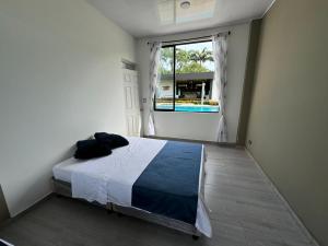 Katil atau katil-katil dalam bilik di Quinta La Bonita Restrepo-Meta
