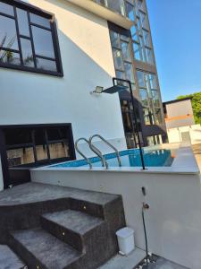 Πισίνα στο ή κοντά στο Flamingo Homestay Port Dickson