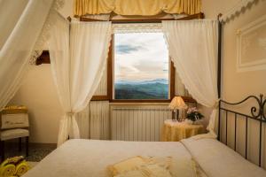 Postel nebo postele na pokoji v ubytování La Sassolina + 84 fotografií