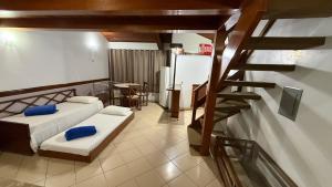 Postel nebo postele na pokoji v ubytování Rio Quente Recanto das Aguas + 18 fotografií