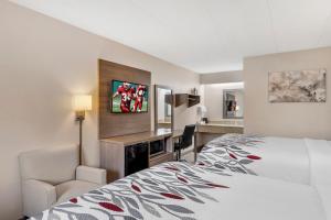 Voodi või voodid majutusasutuse Red Roof Inn Parsippany toas