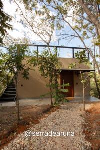a house in the middle of a forest at Serra de Aruna in Pirenópolis