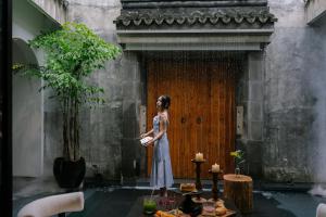 Fotografie z fotogalerie ubytování 江南赋园林私汤设计师民宿 v destinaci Guanqiaocun