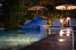 Bazén v ubytování Alit Bungalow Ubud nebo v jeho okolí