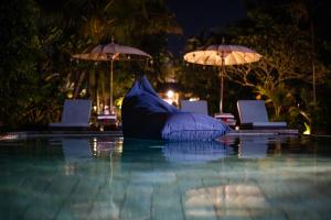 Bazén v ubytování Alit Bungalow Ubud nebo v jeho okolí