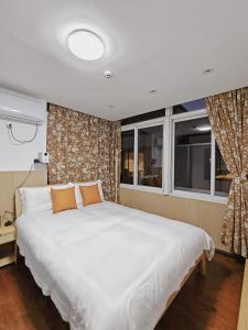 Katil atau katil-katil dalam bilik di Hangzhou West Lake Lingyin Yunqi B&B