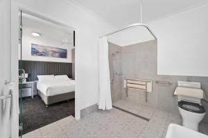 Koupelna v ubytování Palace Hotel Proserpine