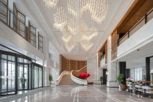 Posezení v ubytování Huhua Mingdu Hotel