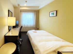 Postel nebo postele na pokoji v ubytování Smile Hotel Yonago + 16 fotografií