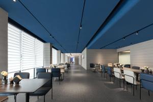 Veitingastaður eða matsölustaður á Atour Light Hotel Shanghai Pudong Chuansha Road