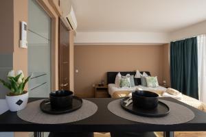 Postel nebo postele na pokoji v ubytování HelloWine Apartman II