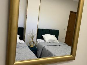 Krevet ili kreveti u jedinici u objektu Hapi Pyramids Hotel