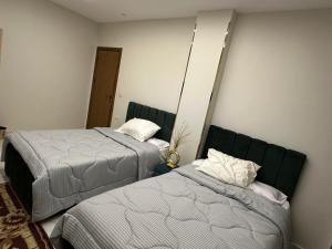 Krevet ili kreveti u jedinici u objektu Hapi Pyramids Hotel