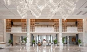 Vstupní hala nebo recepce v ubytování Huhua Mingdu Hotel