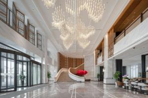 Posezení v ubytování Huhua Mingdu Hotel