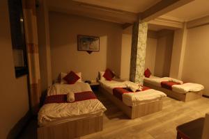 Lova arba lovos apgyvendinimo įstaigoje Bed and Pillow Hostel