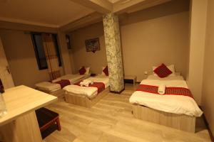 Lova arba lovos apgyvendinimo įstaigoje Bed and Pillow Hostel