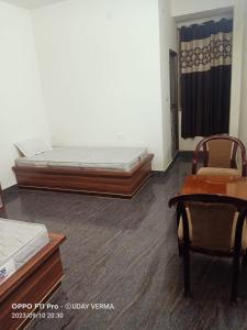 Posezení v ubytování Kumar guest house