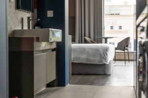 Krevet ili kreveti u jedinici u okviru objekta Homes Stay Myeongdong