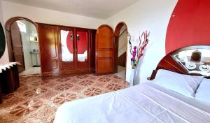 Postel nebo postele na pokoji v ubytování Villa Mauricienne à Calodyne - Piscine privée - 200m plage
