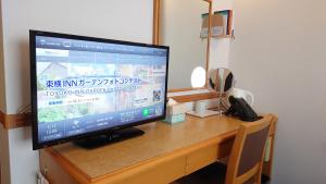 TV a/nebo společenská místnost v ubytování Toyoko Inn Niigata Ekimae