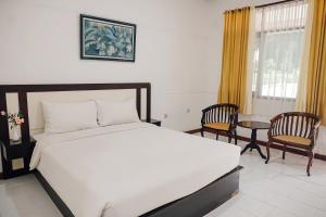 Lembah Ciater Resort Managed by Sahid客房内的一张或多张床位