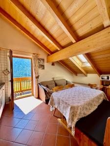 Ένα ή περισσότερα κρεβάτια σε δωμάτιο στο Villa Rosa