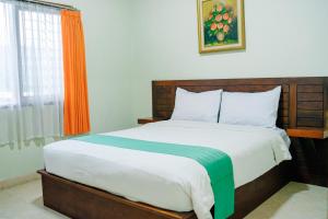 Lembah Ciater Resort Managed by Sahid客房内的一张或多张床位