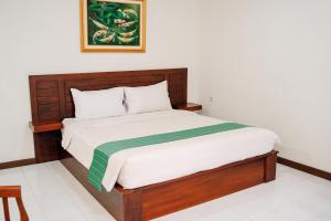 Lembah Ciater Resort Managed by Sahid客房内的一张或多张床位