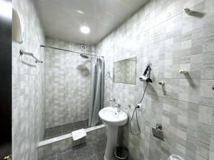 Koupelna v ubytování Hotel Home
