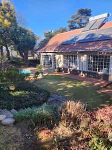 Un jardín fuera de Atlantic Pearl Sandton - Serenity garden Parkmore
