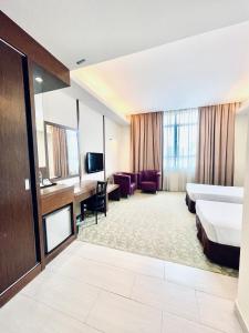 TV a/nebo společenská místnost v ubytování Seemsoon Hotel